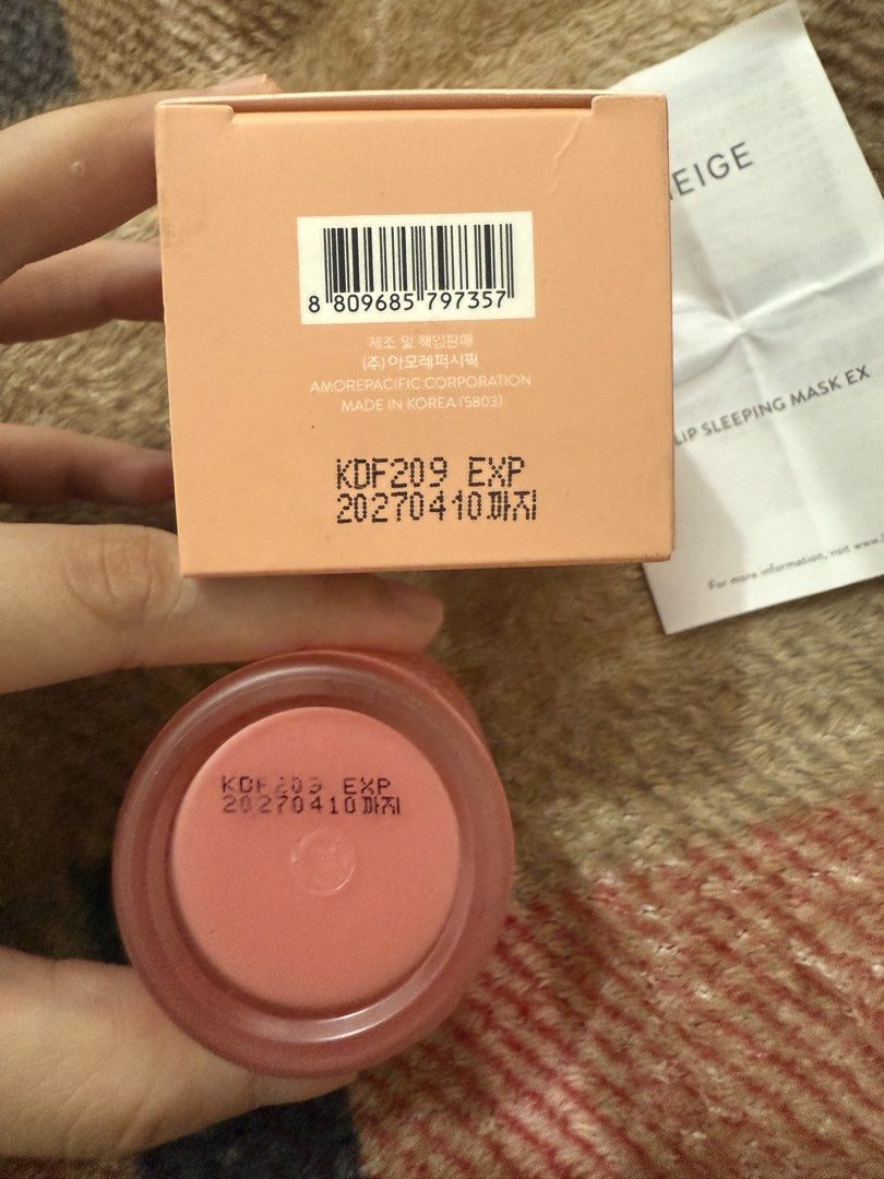 LANEIGE Lip Sleeping Mask EX Grapefruit 20g (Category: Face Care) located in Mandaluyong City. Submitted by whitemoveout (Listing ID 1447548129, Image 2). Description: - LANEIGE Grapefruit Lip Sleeping Mask - Size: 20g - Origin: Made in Korea - Expiry Date: 2027-04-10 - Includes applicator tools.