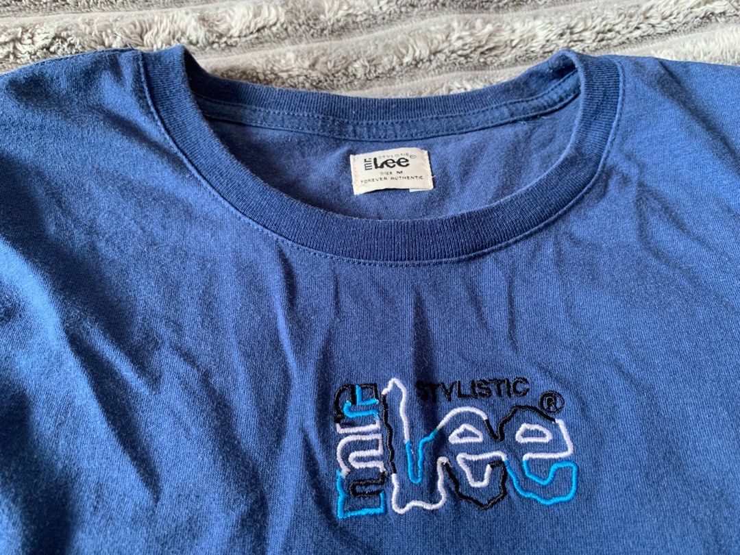 Lee Stylistic Blue T-shirt Size M (Category: Shirts) located in Bulacan. Submitted by fiapple (Listing ID 1447522952, Image 3). Description: - Brand: Lee - Color: Blue - Size: Medium (M) - Design: Embroidered Lee Stylistic logo on chest - Material: Comfortable cotton - Occasion: Ideal for casual wear.