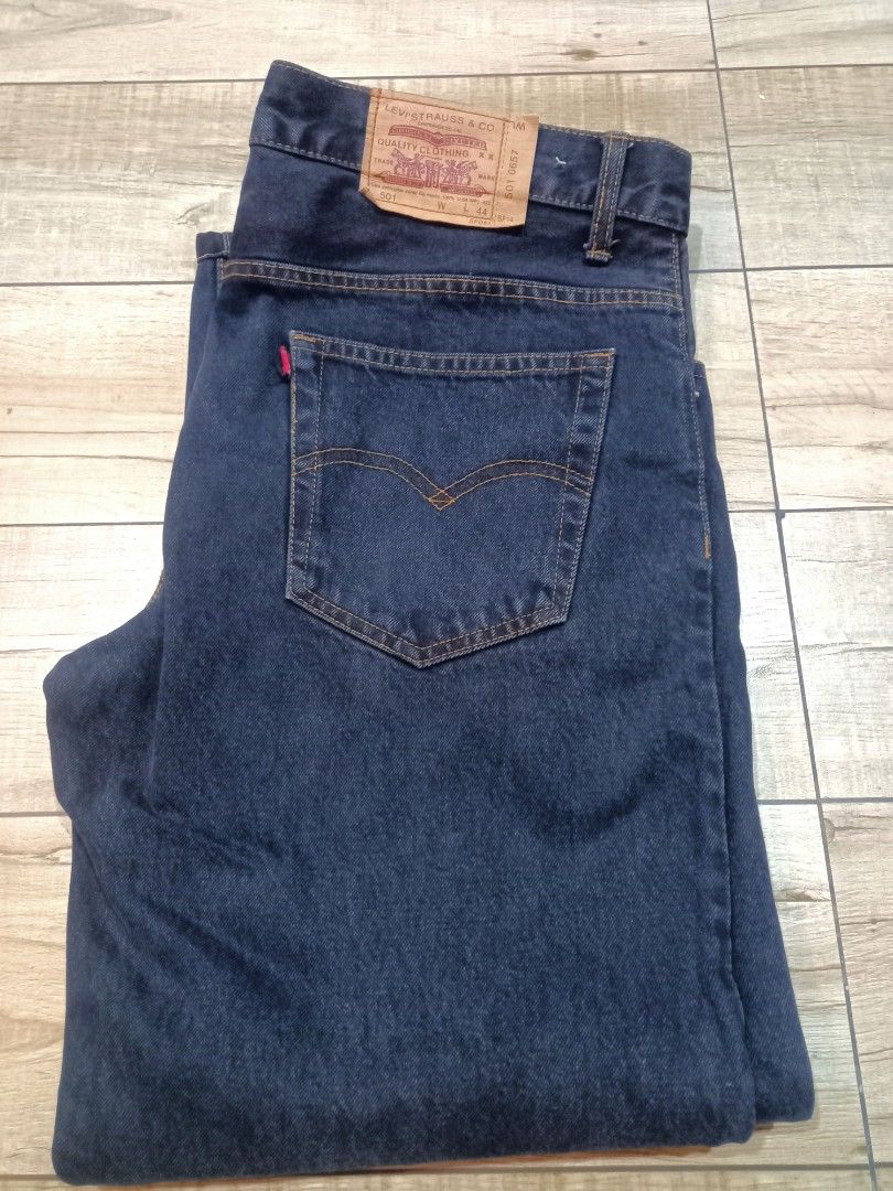 Levi's 501 Dark Wash Button Fly Jeans (Category: Jeans) located in Manila. Submitted by jansbenonlineshop18 (Listing ID 1447623515, Image 2). Description: - Classic Levi's 501 jeans - Dark wash denim - Button fly closure - Standard five-pocket styling - Iconic red tab and leather patch on back - Wardrobe staple, great for casual wear.