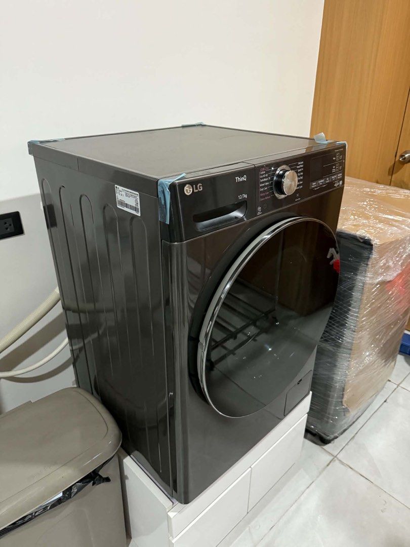 LG Fully Automatic ThinQ Washing Machine-12/7kg with dryer (Category: Washing Machines and Dryers) located in Mandaluyong City. Submitted by packedandboxed (Listing ID 1447644773, Image 2). Description: Unit bought in 2024 for 50,000.00 - LG ThinQ Washing Machine - Capacity: 12kg Wash / 7kg Dry - Key Features: TurboWash 39, Allergy Care, Steam Refresh, Smart Diagnosis - Wash Cycles: Cotton, Eco 40-60, Mixed Fabric, Easy Care, Delicates, Wool, Spe