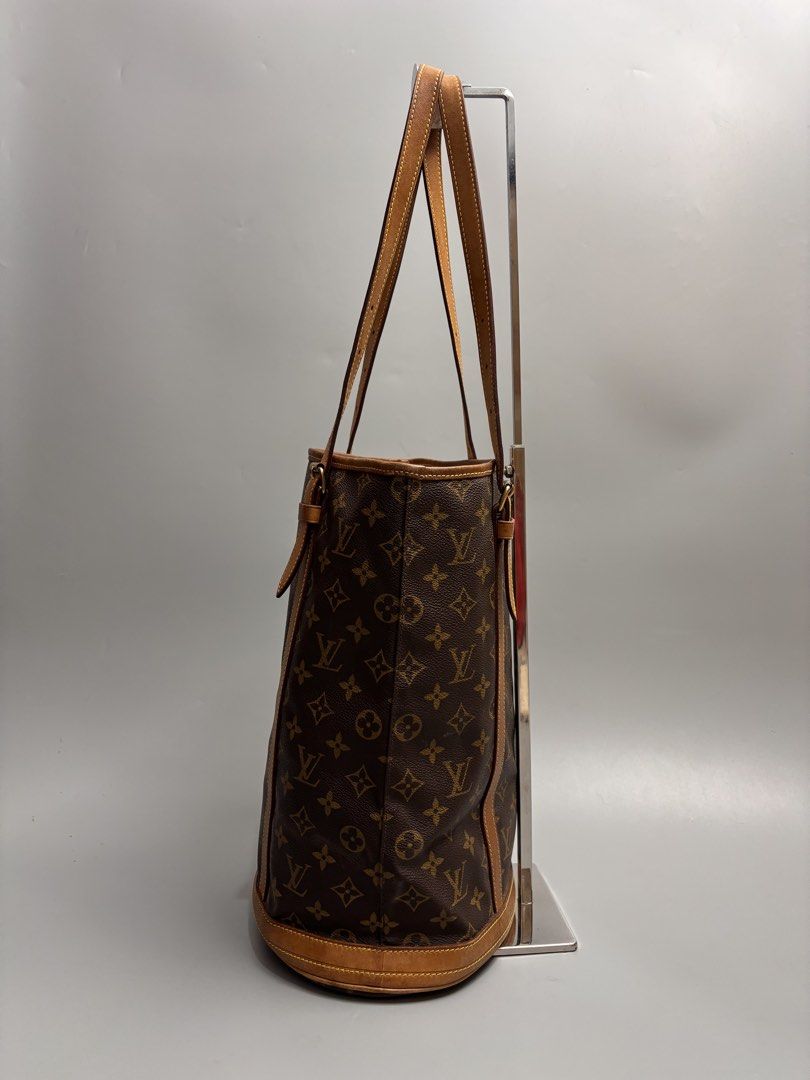 Louis Vuitton Monogram Bucket Bag (Category: Luxury Bags & Wallets) located in Quezon City. Submitted by lucky.purelux.ph (Listing ID 1447585932, Image 3). Description: - Classic Louis Vuitton bucket bag - Monogram canvas with tan leather trim and straps - Timeless and versatile design - Ample interior space for essentials - Perfect for daily use or travel.