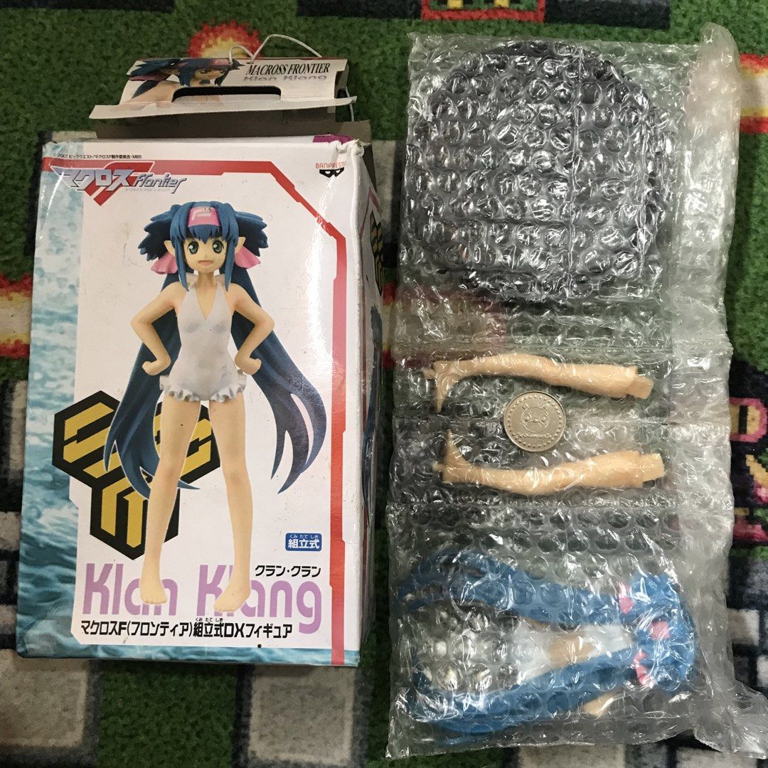 Macross Frontier Klan Klan DX Figure Banpresto (Category: Figurines & Statues) located in Rizal. Submitted by makoroku89 (Listing ID 1447517874, Image 1). Description: -Coin in the photo was used as a reference for scale comparison -Figure parts still in sealed Note: Please message me first before decide to purchase..