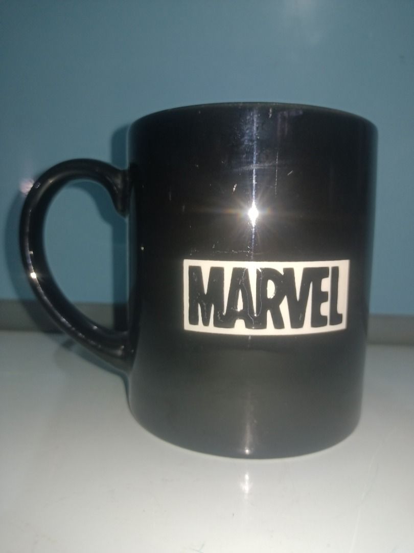 Marvel Spider-Man Black Mug Engraved finish not printed (Category: Coffee & Tea Tableware) located in Munoz. Submitted by larryc1212 (Listing ID 1447613819, Image 2). Description: - Black mug featuring a Spider-Man logo and name. - Engraved finish not printed - Includes a Marvel logo on the back. - Made by T's Factory. - Approximately 3.5 inches tall. - Perfect gift for any Spider-Man enthusiast. - Great for enjoying coffee or tea. Disclaimer: It