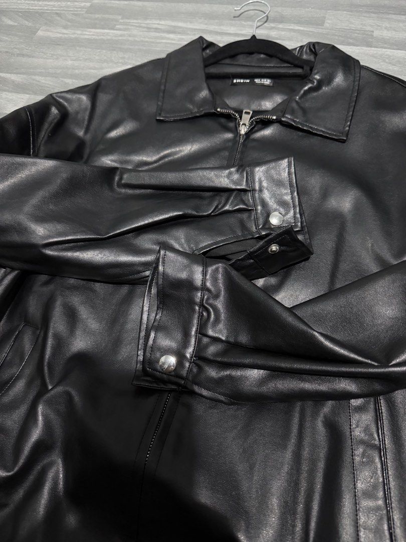 Men Black Leather Jacket (Category: Coats, Jackets and Outerwear) located in Valenzuela. Submitted by crldvdt (Listing ID 1447533068, Image 2). Description: Black Men Leather Jacket Brand new condition 22.5x24 inches.