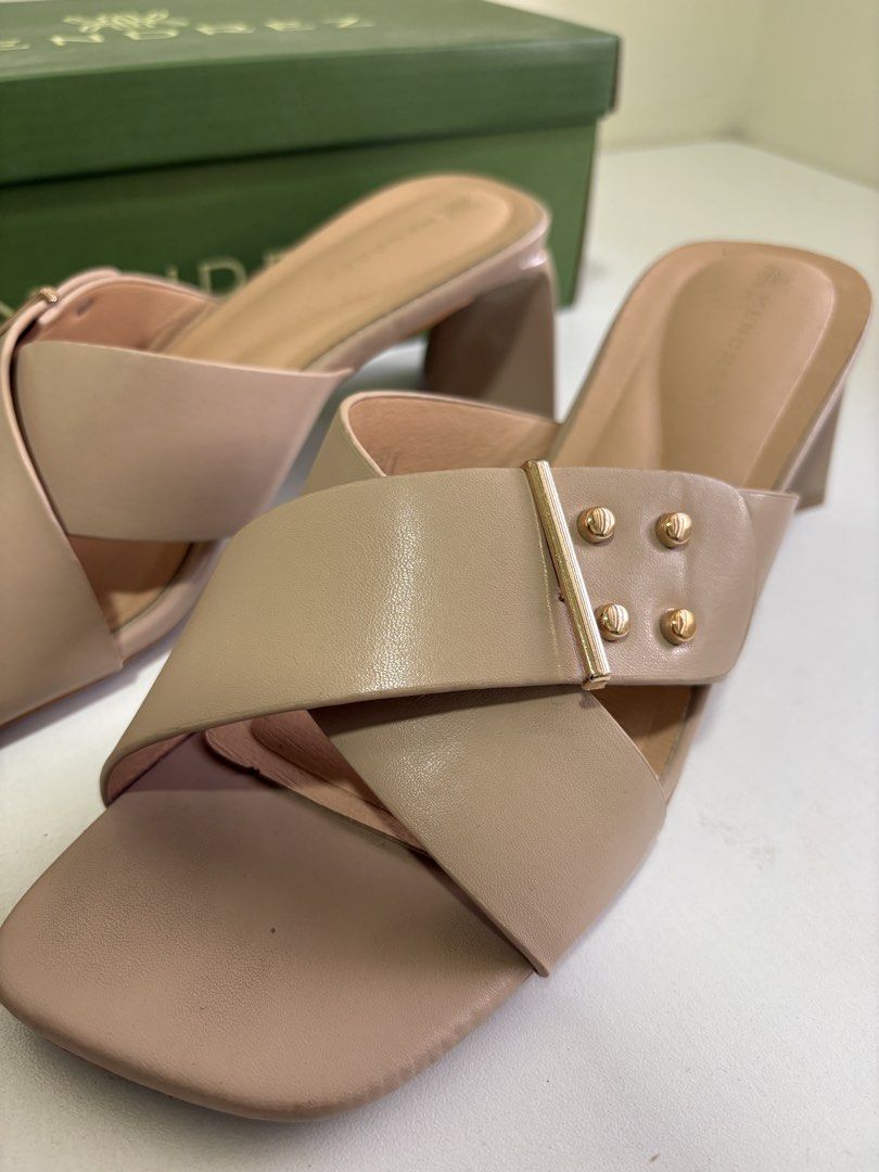 Size 7 - Mendrez Beige Cross Strap Block Heels with Box (Category: Heels) located in Mandaluyong City. Submitted by twonett (Listing ID 1447563570, Image 2). Description: - Bought for 1,500 - Used once - Chic beige Mendrez heels - Stylish cross strap design with gold stud accents - Comfortable and stable chunky block heel - Easy slip-on style for convenience - Comes with the original Mendrez box.