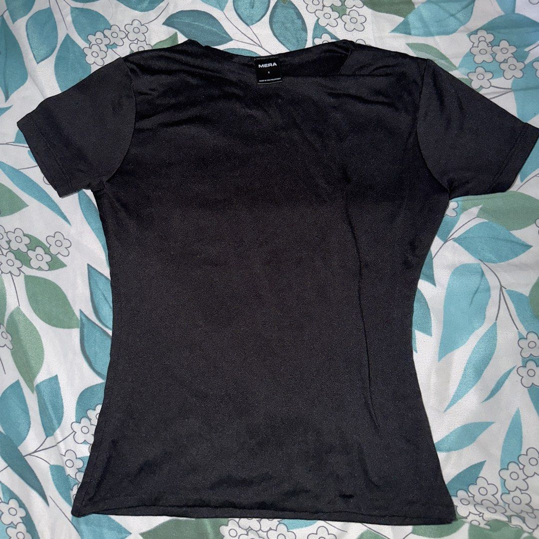 MERA Black T-shirt Top (Category: Shirts) located in Quezon City. Submitted by izanari (Listing ID 1447588354, Image 1). Description: - Brand: MERA - Color: Black - Fits XS/S - Style: Basic T-Shirt - Features: Double Lined Short sleeves, Crew neck - Versatility: Ideal for everyday wear.