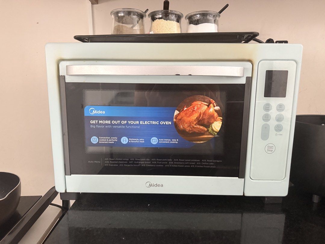 Midea 40L Electric Oven w/ Convection (Category: Ovens & Toasters) located in Binangonan. Submitted by yourmamaaa (Listing ID 1447510967, Image 1). Description: Midea Electric Oven - Color: Light Blue - Ideal for roasting, baking, and more - Features convenient auto menus for easy cooking - Sold as is - No functional issues - May signs of usage - Needs cleaning - Rfs: Hindi nagagamit Original Price: 7,795 Date of Purchase: July 7, 2025.