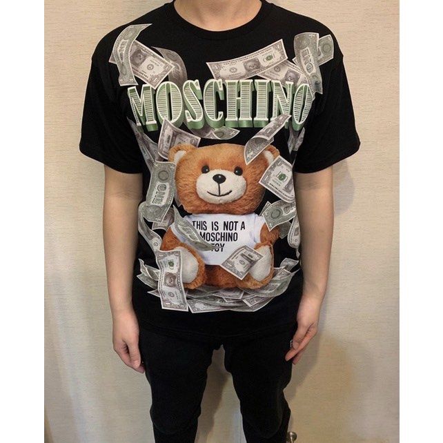 MOSCHINO DOLLAR TEDDY BEAR SHIRT (Category: Luxury Apparel) located in Valenzuela. Submitted by secret_closet_ph (Listing ID 1447660445, Image 2). Description: MOSCHINO DOLLAR TEDDY BEAR SHIRT LARGE FITTING L29 W22 9/10 CONDITION 749 PESOS.