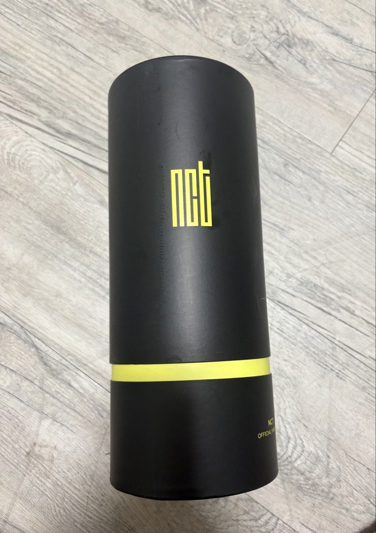 NCT Official Fanlight with Case Neobong (Category: K-Wave Merchandise) located in Antipolo. Submitted by allysarchive (Listing ID 1447627561, Image 2). Description: - Authentic NCT Official Fanlight - Includes original black and yellow cylindrical case - Fanlight features white and neon green design - Case displays the NCT logo in yellow - Ideal for NCTzens, concert use, and collection completion - Used during a concert twice only.