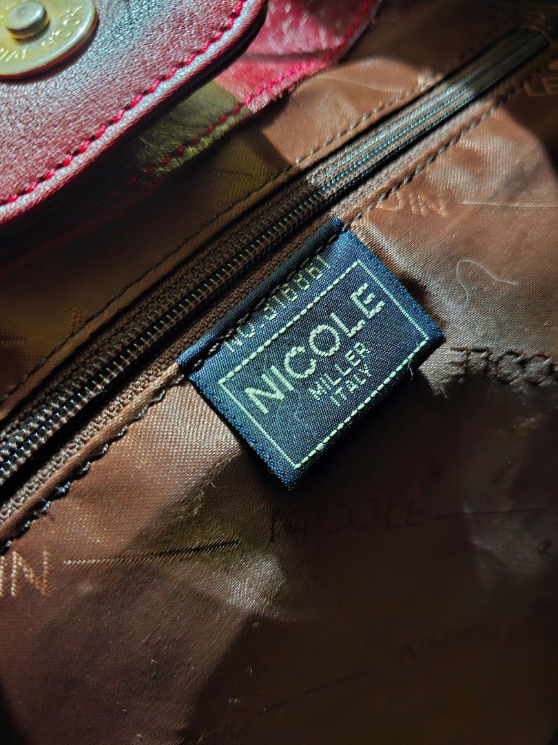 Nicole Miller Bucket Bag (Category: Purses & Pouches) located in Cauayan City . Submitted by minyoongi3993 (Listing ID 1447630972, Image 3). Description: Nicole Miller Red Bucket Bag made of genuine leather. PM for more pictures if interested..