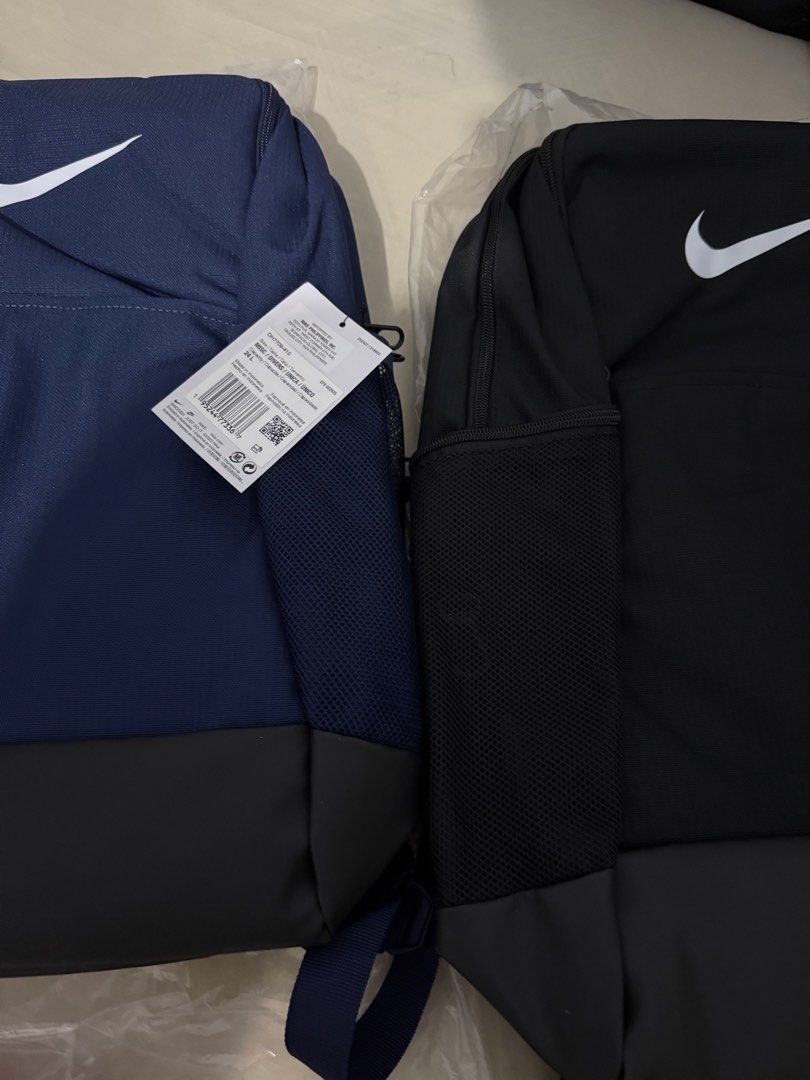 Nike Backpack Brandnew - Black & Navy Blue (Category: Backpacks) located in Quezon City. Submitted by marcothegreat1992 (Listing ID 1447582786, Image 3). Description: Brand new Nike backpacks (black & navy blue) with tags! Features swoosh logo, mesh side pockets, and padded straps. Perfect for school, gym, or daily use. BRANDNEW 1,580 each Negotiable if dalawa kukunin Sobrang gandang backpack ng Nike! Perfect for gift, gym, school, office and eve