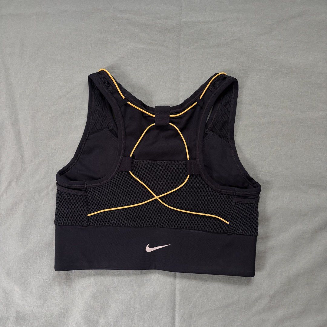 NIKE black sports bra (Category: Activewear) located in Quezon City. Submitted by _amcc (Listing ID 1447554907, Image 2). Description: - used 3x.
