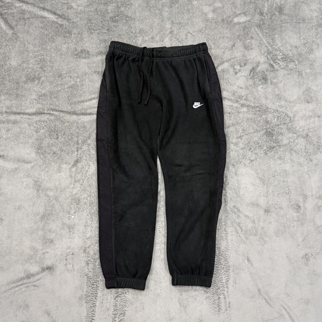 NIKE FLEECE JOGGER PANTS (Category: Joggers) located in Santa Maria. Submitted by rarefindslt (Listing ID 1447511741, Image 1). Description: NIKE FLEECE JOGGER PANTS (SWIPE LEFT FOR MORE DETAILS..) L on tag in solid good condition rate! with tags for authenticity, adjustable string, side pockets, embroidered side swoosh script logo, heavy cotton material, in solid black color rate! (photo may vary due to lighting but solid black color rate) can p