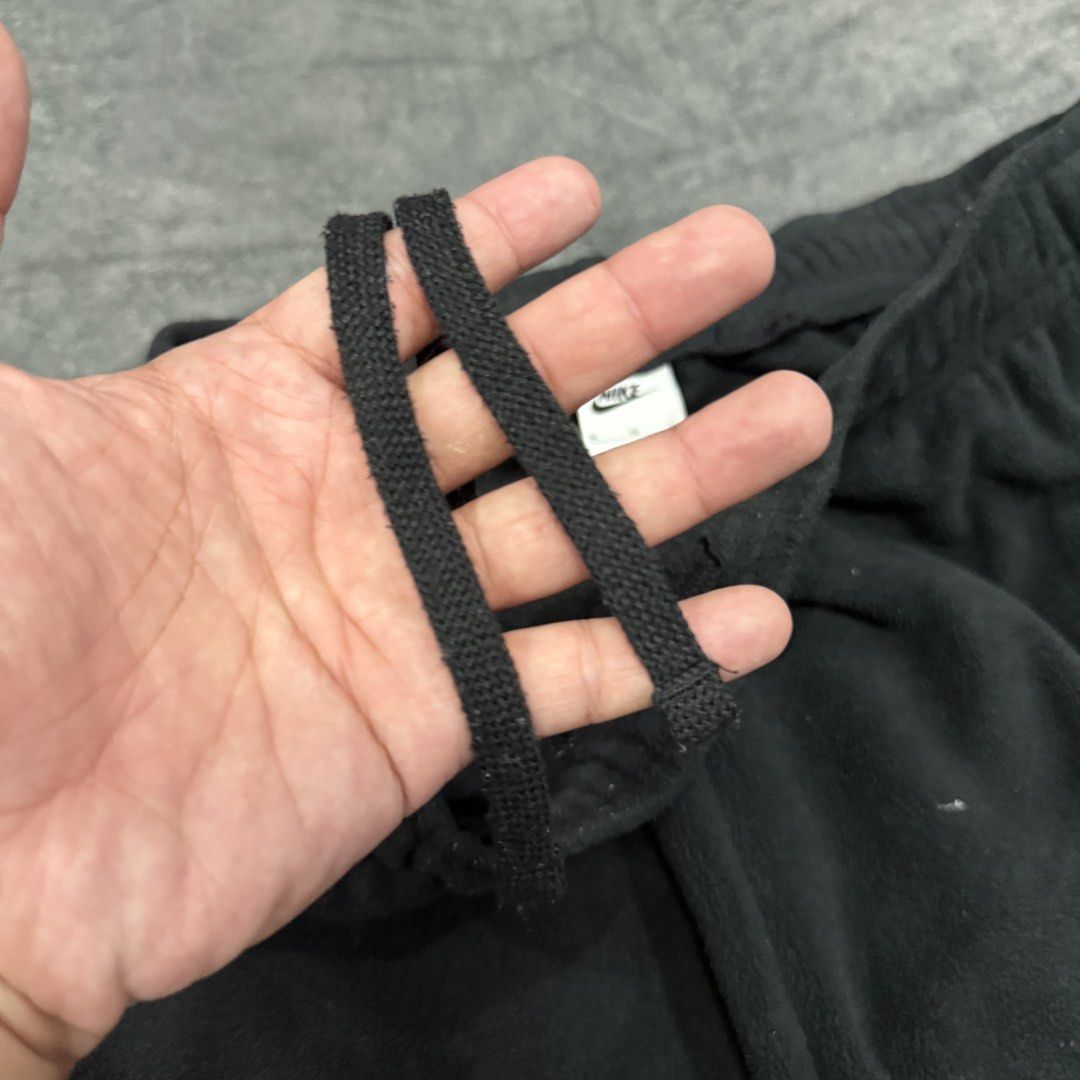 NIKE FLEECE JOGGER PANTS (Category: Joggers) located in Santa Maria. Submitted by rarefindslt (Listing ID 1447511741, Image 3). Description: NIKE FLEECE JOGGER PANTS (SWIPE LEFT FOR MORE DETAILS..) L on tag in solid good condition rate! with tags for authenticity, adjustable string, side pockets, embroidered side swoosh script logo, heavy cotton material, in solid black color rate! (photo may vary due to lighting but solid black color rate) can p