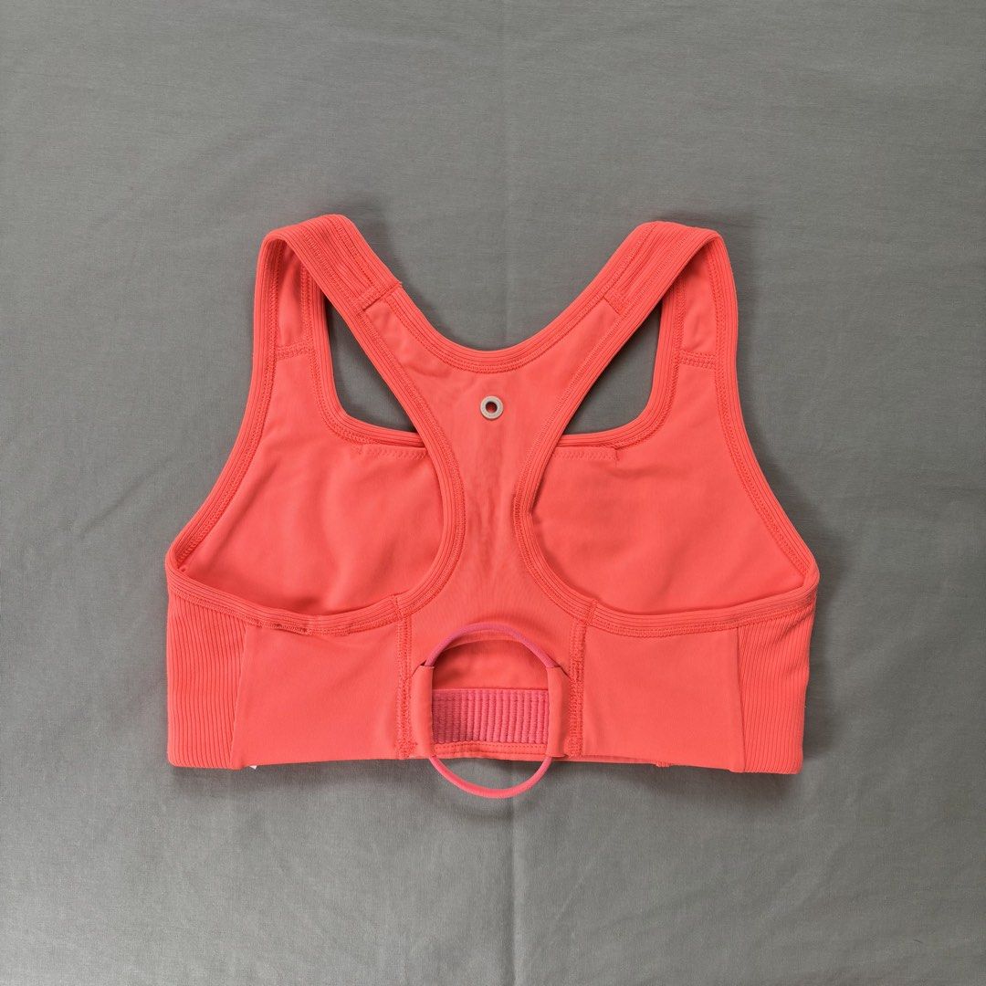 NIKE Orange Sports Bra (Category: Activewear) located in Quezon City. Submitted by _amcc (Listing ID 1447571929, Image 2). Description: - with flaw (see photo).