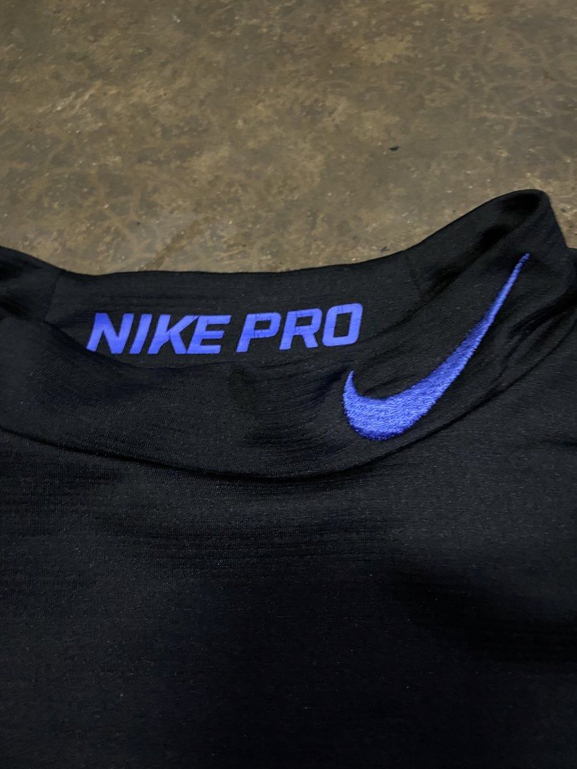 Nike Pro Hyperwarm Compression Long Sleeve Shirt (Category: Activewear) located in Malabon City. Submitted by yivsthrift (Listing ID 1447645147, Image 2). Description: - Black Nike Pro Hyperwarm Compression Long Sleeve Shirt - Blue accents on collar and shoulders - Size: L - Offers warmth and compression - Ideal for training or everyday wear - 28 x 17.
