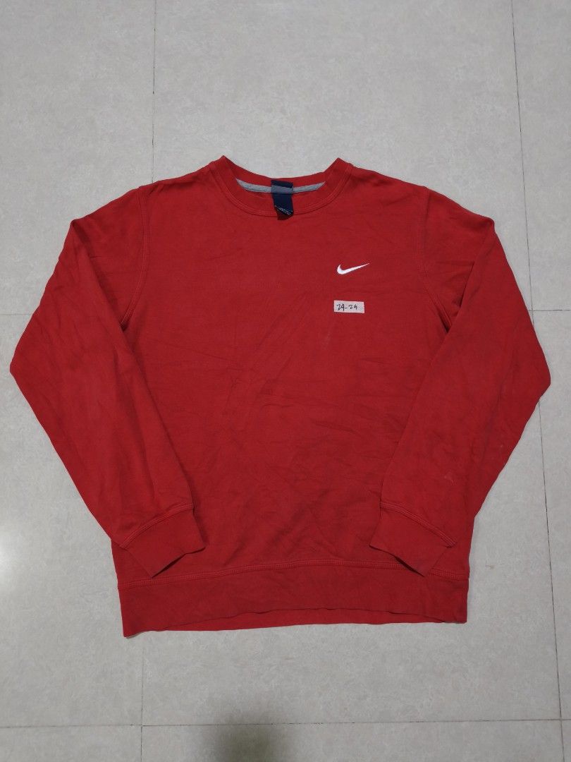 Nike Red Crewneck Sweatshirt Size L (Category: Coats, Jackets and Outerwear) located in Quezon City. Submitted by jamtnf (Listing ID 1447643231, Image 1). Description: - Red Nike Sweatshirt - Size: Large (L) - Made in Pakistan - Crewneck style with long sleeves - Features the classic Nike swoosh logo on the chest - Ideal for casual outings or workouts.