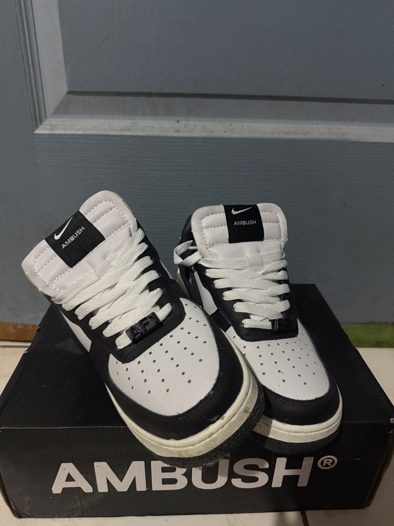 Nike x Ambush Air Force 1 High Black White (Category: Sneakers) located in Dagupan City. Submitted by shlyukha (Listing ID 1447649253, Image 3). Description: - Nike Air Force 1 High x Ambush collaboration - Classic black and white colorway - High-top silhouette - Includes original Ambush box - Perfect addition to any sneaker collection.