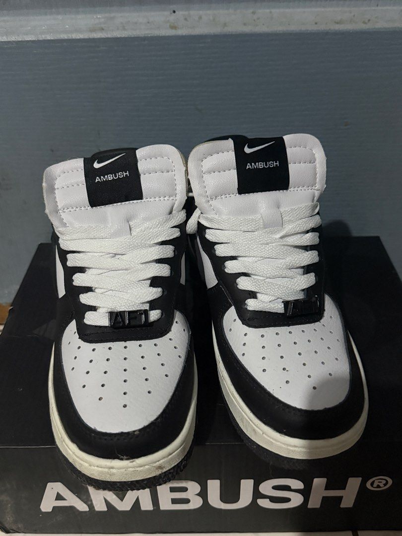 Nike x Ambush Air Force 1 High Black White (Category: Sneakers) located in Dagupan City. Submitted by shlyukha (Listing ID 1447649253, Image 2). Description: - Nike Air Force 1 High x Ambush collaboration - Classic black and white colorway - High-top silhouette - Includes original Ambush box - Perfect addition to any sneaker collection.