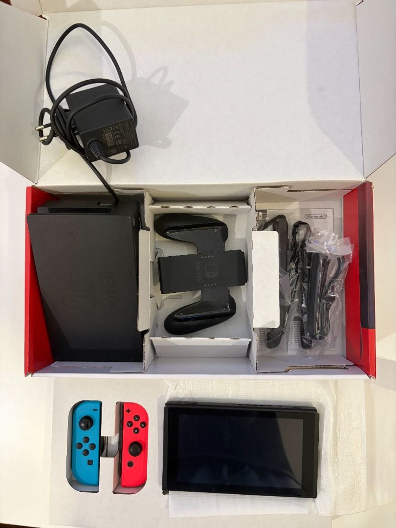 Nintendo Switch Console with Joy-Cons and Accessories (Category: Nintendo) located in Santa Rosa. Submitted by fiercehorse.4cd05b (Listing ID 1447486484, Image 2). Description: - Nintendo Switch Console - European plug - Original Dock - Blue and Red Joy-Cons - AC Adapter - All Necessary Cables - Original Packaging Included - Ready to Play Out of the Box.
