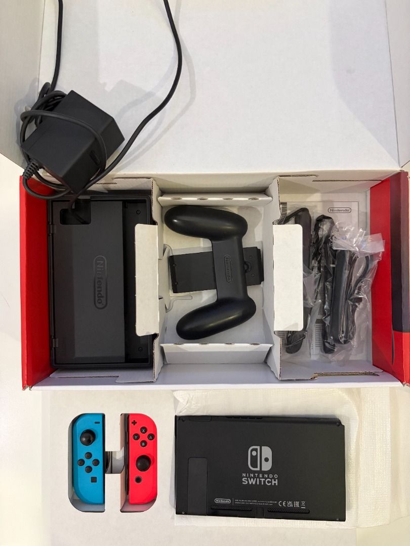 Nintendo Switch Console with Joy-Cons and Accessories (Category: Nintendo) located in Santa Rosa. Submitted by fiercehorse.4cd05b (Listing ID 1447486484, Image 1). Description: - Nintendo Switch Console - European plug - Original Dock - Blue and Red Joy-Cons - AC Adapter - All Necessary Cables - Original Packaging Included - Ready to Play Out of the Box.