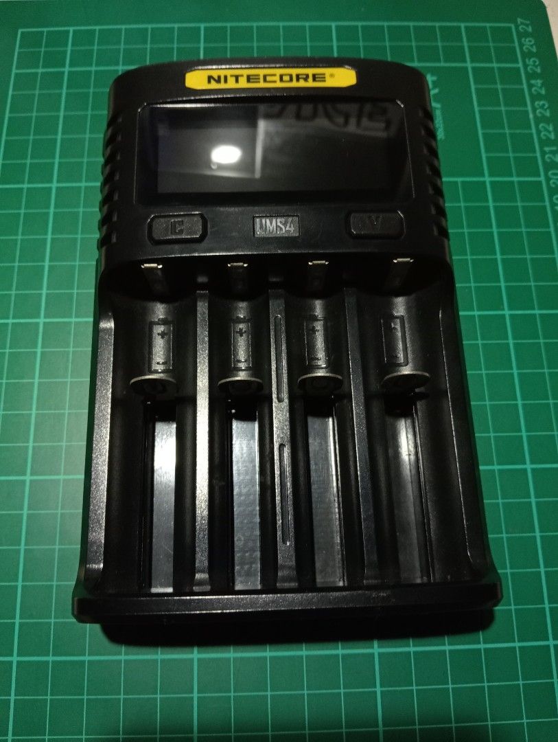 Nitecore UMS4 battery charger (Category: Batteries & Chargers) located in Quezon City. Submitted by wet_boots (Listing ID 1443728378, Image 2). Description: Nitecore UMS4 battery charger Compatible with: IMR/Li-ion/LiFePO4: 10440, 14500, 14650, 16500, 16340(RCR123), 16650, 17350, 17500, 17650, 17670, 17700, 18350, 18490, 18500, 18650, 18700, 20700, 21700, 22500, 22650, 25500, 26500, 26650, 26700, AA, AAA, AAAA.