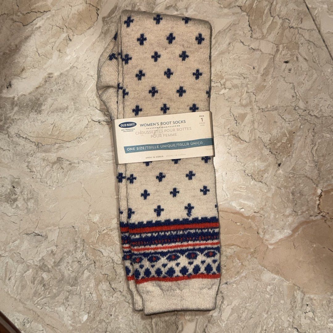 Old Navy Women's Boot Socks - One Size (Category: Socks & Tights) located in Quezon City. Submitted by EveryWANTShop (Listing ID 1447575757, Image 1). Description: - Cream colored boot socks from Old Navy - Features a cute navy blue cross pattern all over - Cuffs have a red and blue striped pattern - Made in Korea - One size fits most - Ideal for wearing with boots during fall and winter.