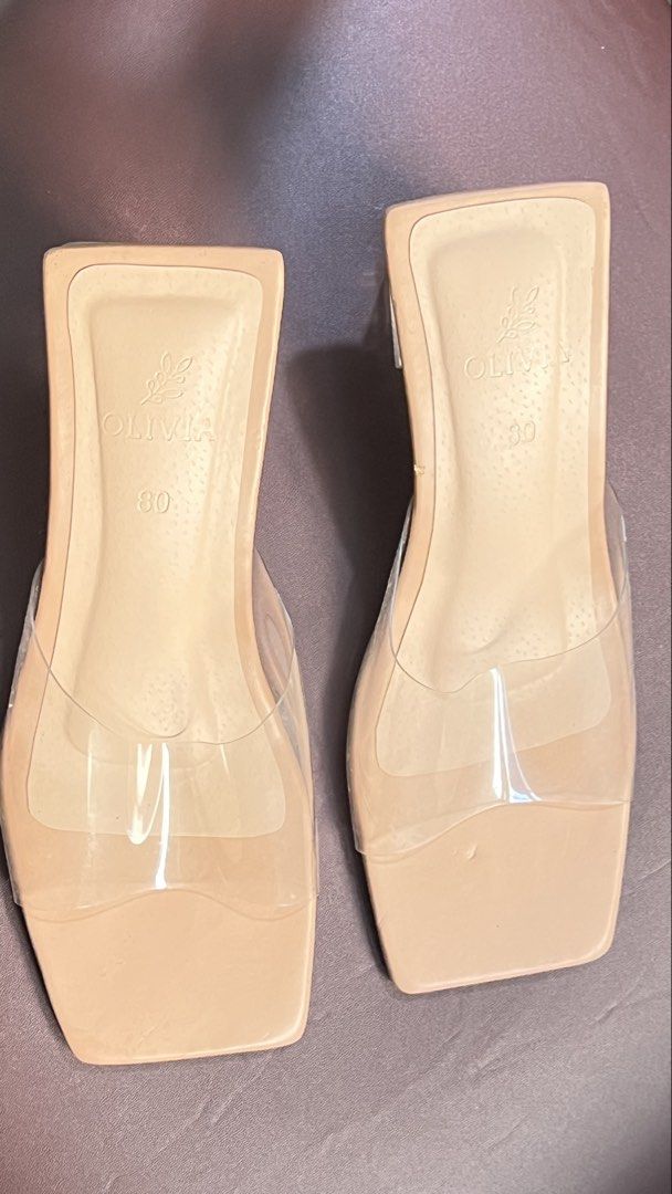 Olivia Clear Strap Block Heels Sandals (Category: Heels) located in Bulacan. Submitted by rds.declutter (Listing ID 1447595782, Image 1). Description: - Stylish clear strap sandals - Beige sole and chic square toe - Comfortable 2-inch chunky block heel - Easy slip-on design - Versatile for dressing up or down rfs: decluttering.