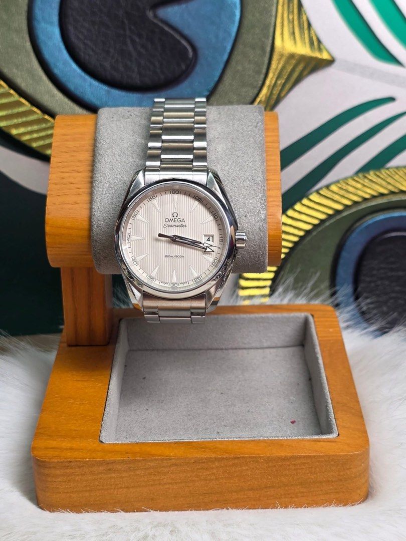OMEGA SEAMASTER AQUA TERRA 39mm (Category: Luxury Watches) located in Manila. Submitted by sg.vault (Listing ID 1447576590, Image 2). Description: 2017 Model Mint like new(9.7/10 ratings) Full set w/ box, card, extra links and manual Quartz Silver dial 39 mm case diameter 16 links ‼️70k below market price.