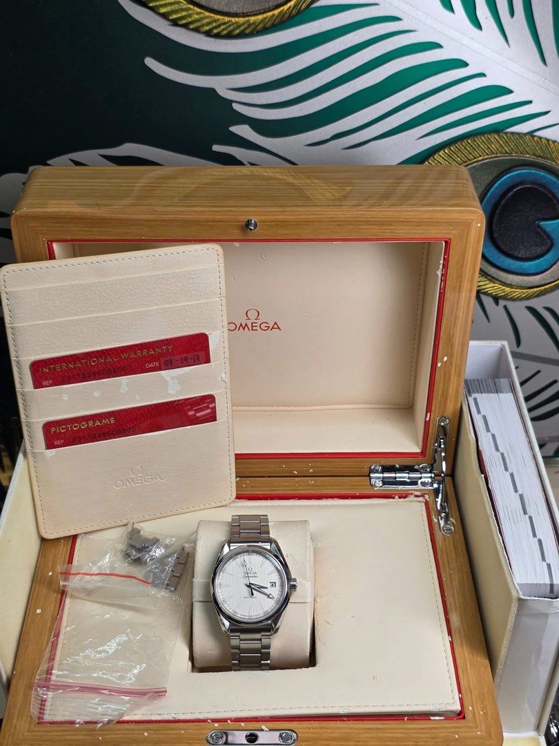 OMEGA SEAMASTER AQUA TERRA 39mm (Category: Luxury Watches) located in Manila. Submitted by sg.vault (Listing ID 1447576590, Image 3). Description: 2017 Model Mint like new(9.7/10 ratings) Full set w/ box, card, extra links and manual Quartz Silver dial 39 mm case diameter 16 links ‼️70k below market price.