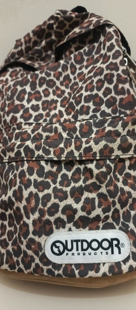 Outdoor Products Leopard Print Mini Backpack (Category: Backpacks) located in Santa Cruz. Submitted by jm.stuffs (Listing ID 1447631739, Image 3). Description: - Cute leopard print mini backpack from Outdoor Products. - Main compartment and front pocket for storage. - Adjustable straps for a comfortable fit. - Perfect for everyday use or quick outings. - Shows some signs of wear, but plenty of life left..