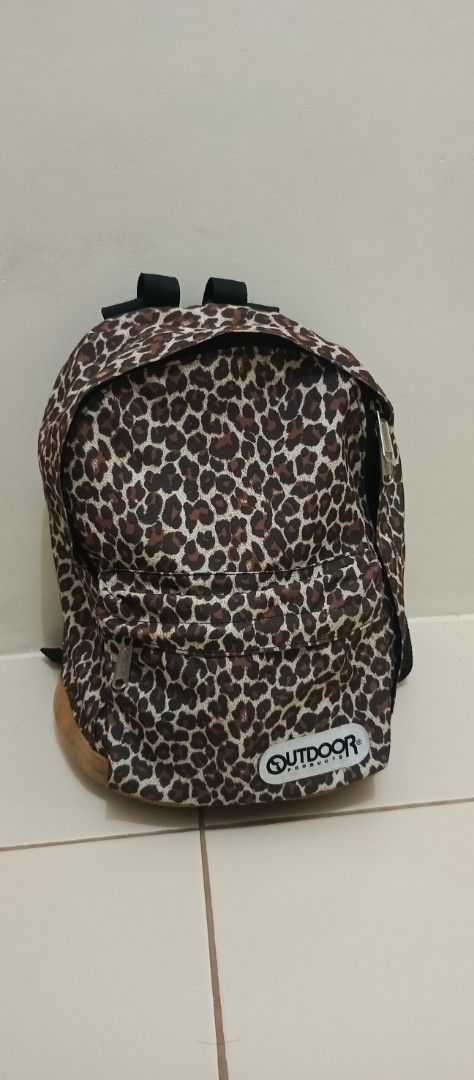 Outdoor Products Leopard Print Mini Backpack (Category: Backpacks) located in Santa Cruz. Submitted by jm.stuffs (Listing ID 1447631739, Image 1). Description: - Cute leopard print mini backpack from Outdoor Products. - Main compartment and front pocket for storage. - Adjustable straps for a comfortable fit. - Perfect for everyday use or quick outings. - Shows some signs of wear, but plenty of life left..