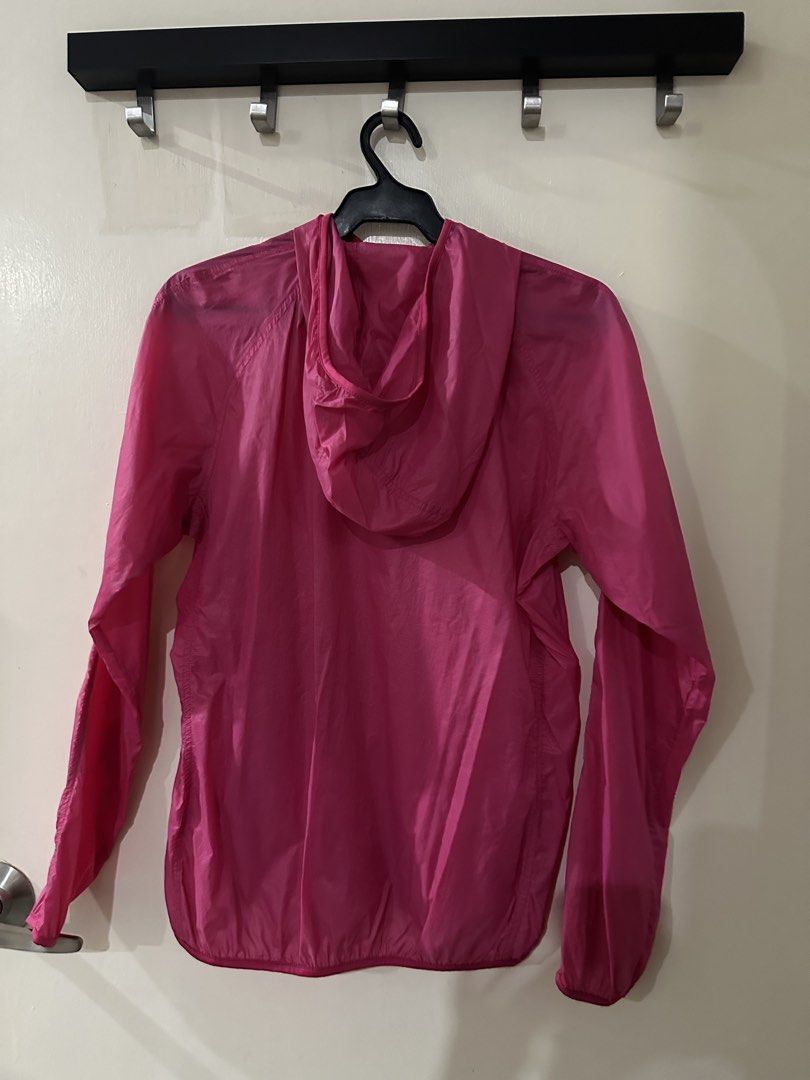 Pink Lightweight Hooded Windbreaker Jacket (Category: Coats, Jackets and Outerwear) located in Manila. Submitted by bellevd (Listing ID 1447548566, Image 2). Description: - Lightweight pink windbreaker jacket - Features a hood - Full zip closure - Ideal for layering or windy days - Easy to pack and carry - Suitable for outdoor activities and casual wear - Simple and functional design.
