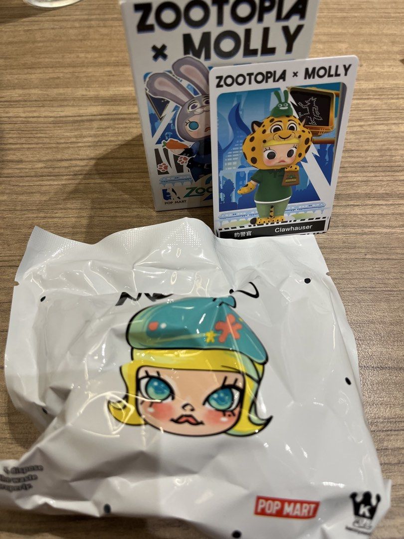 Pop Mart Molly x Zootopia Blind Box Clawhauser (Category: Designer & Blind Box Toys) located in Quezon City. Submitted by mymeloooo (Listing ID 1447544991, Image 2). Description: - mop: gcash/bank transfer/maya - mod: j&t/lalamove - unopened bag - with card and box - willing to trade! - (for trade) lf: judy hopps, nick wilde, gary, russ, nibbles, and gazelle - rfs: dupe .