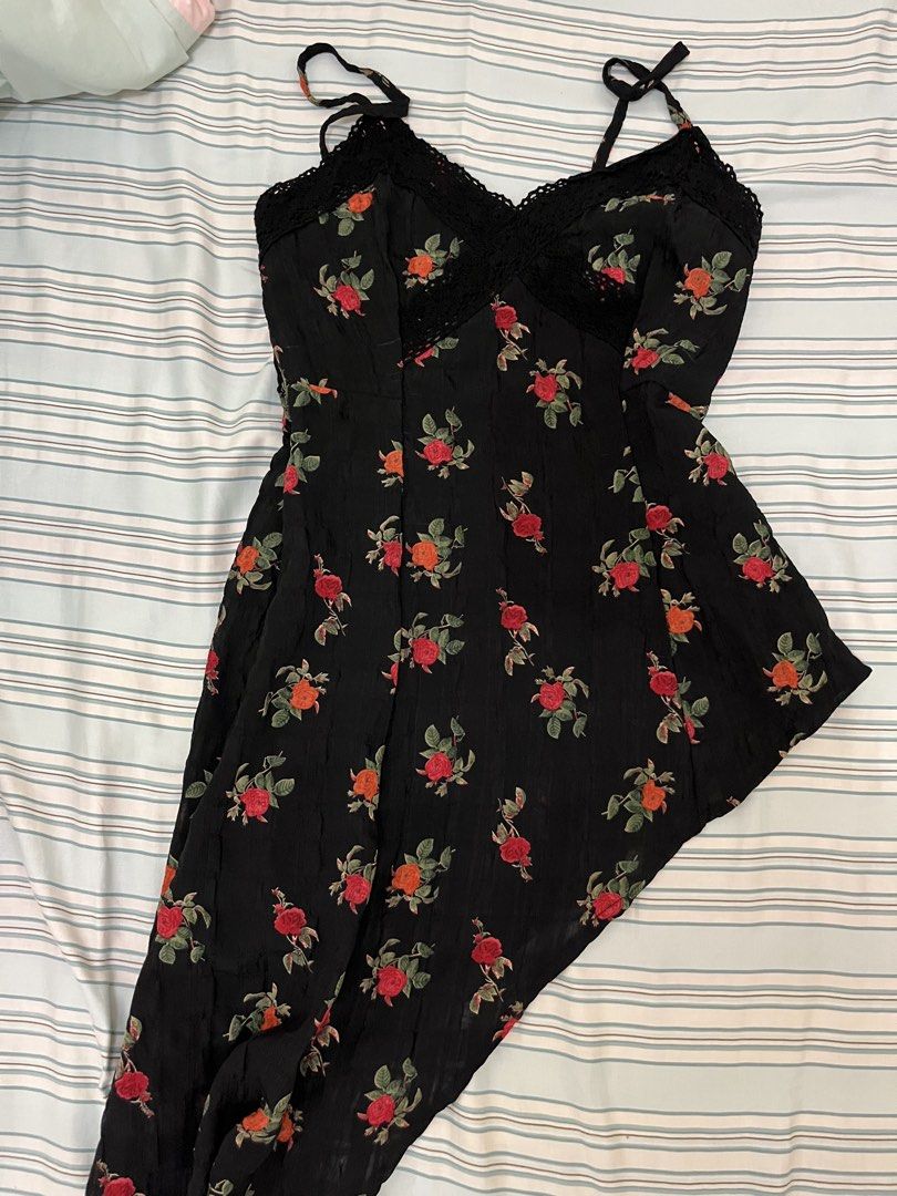 Pretty black asymmetrical top (Category: Sleeveless) located in Tuguegarao City. Submitted by declutterf (Listing ID 1447514546, Image 1). Description: Fits XS-S (fits 34B comfortably as well) super pretty with smocked back.