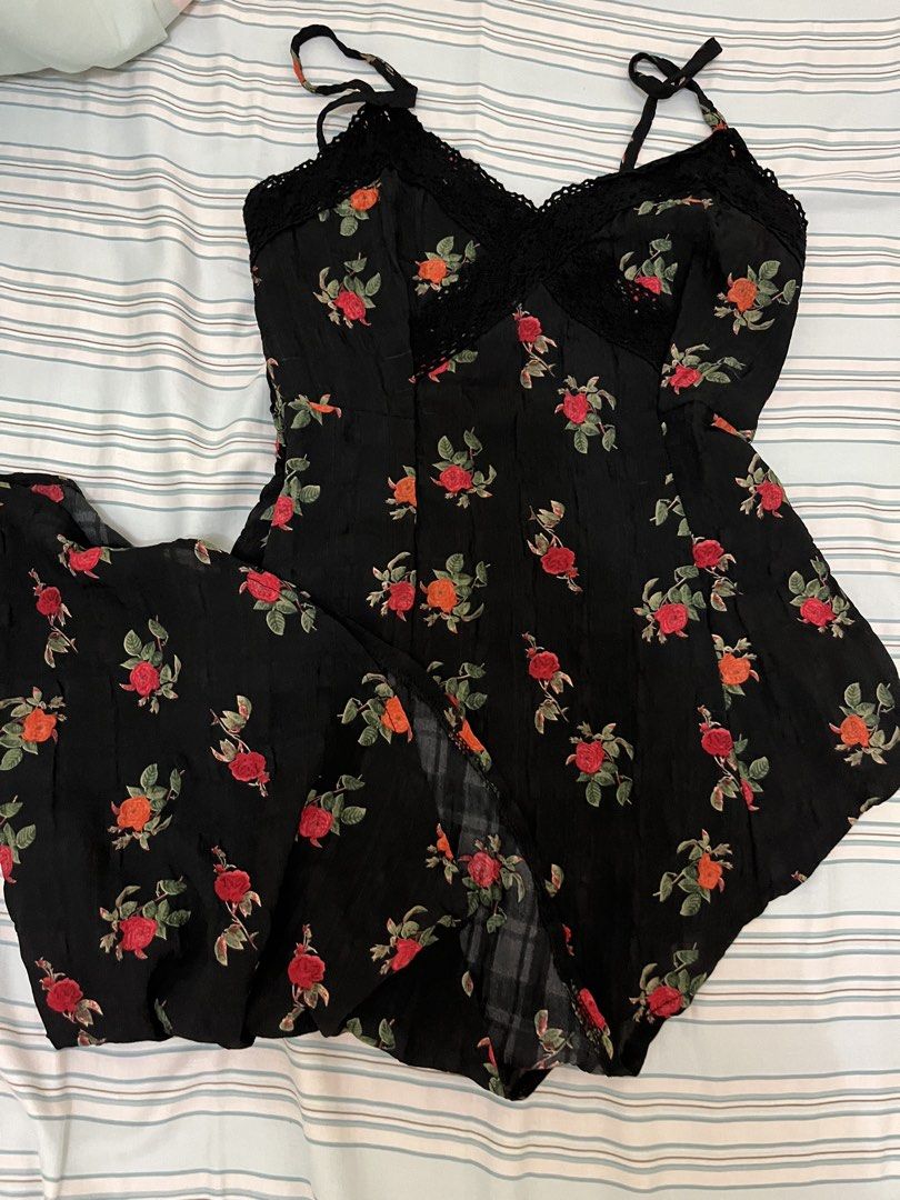 Pretty black asymmetrical top (Category: Sleeveless) located in Tuguegarao City. Submitted by declutterf (Listing ID 1447514546, Image 2). Description: Fits XS-S (fits 34B comfortably as well) super pretty with smocked back.