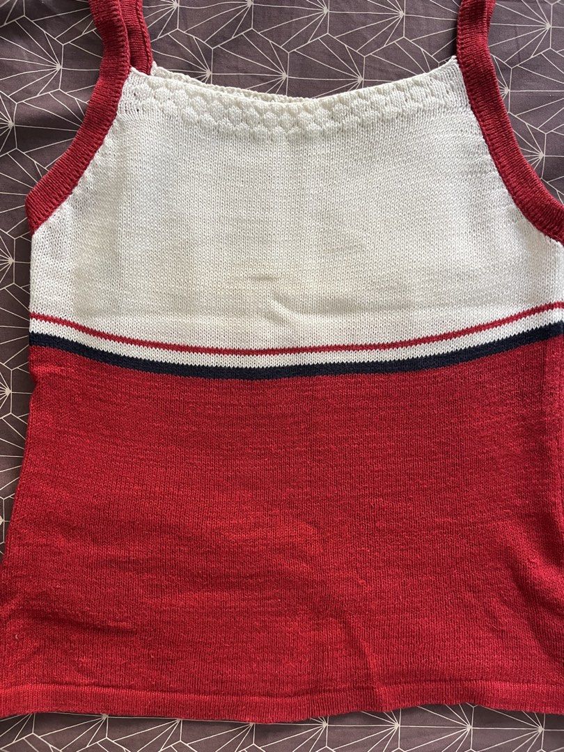 Red White Blue Striped Knit Tank Top (Category: Sleeveless) located in Manila. Submitted by jiden26 (Listing ID 1447541885, Image 2). Description: - Red, white, and blue striped knit tank top - Features a textured detail at the neckline - Thin straps for a delicate look - Versatile for casual outfits or layering - Easily pairs with jeans or shorts.