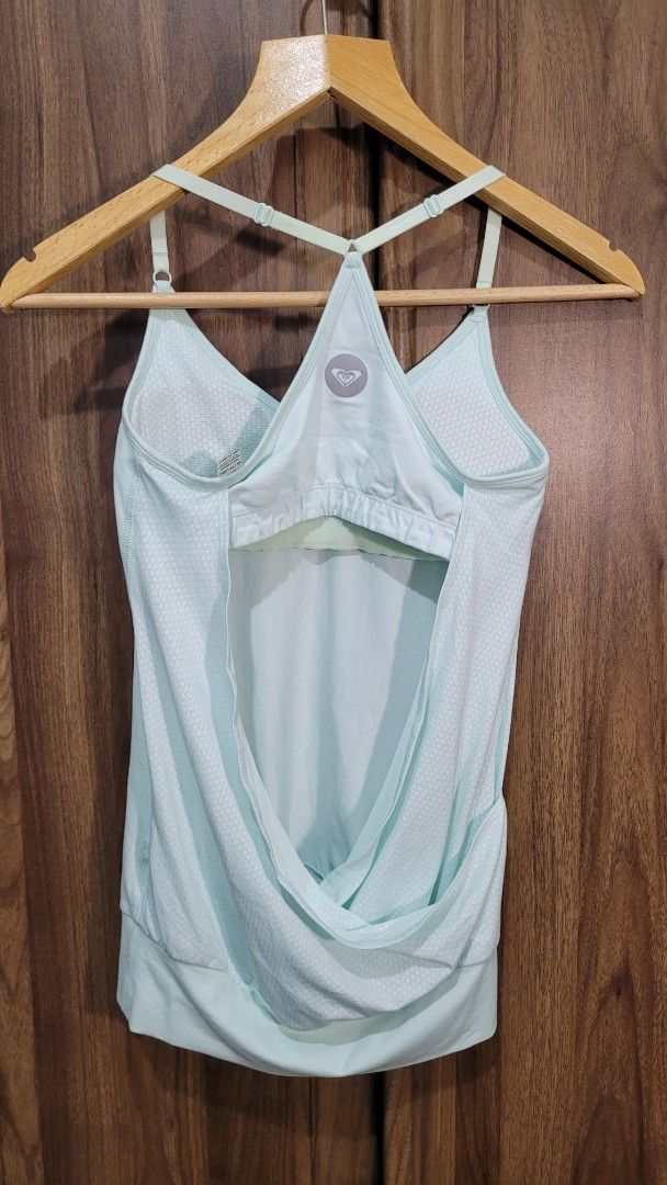 Roxy Dry Flight Tank Top XS Mint Green (Category: Activewear) located in Davao. Submitted by NearlyNew (Listing ID 1447511141, Image 2). Description: - Roxy mint green tank top - Racerback design - Dry Flight technology for moisture-wicking and breathability - Size XS - Ideal for workouts and casual wear - Comfortable and breathable fabric.