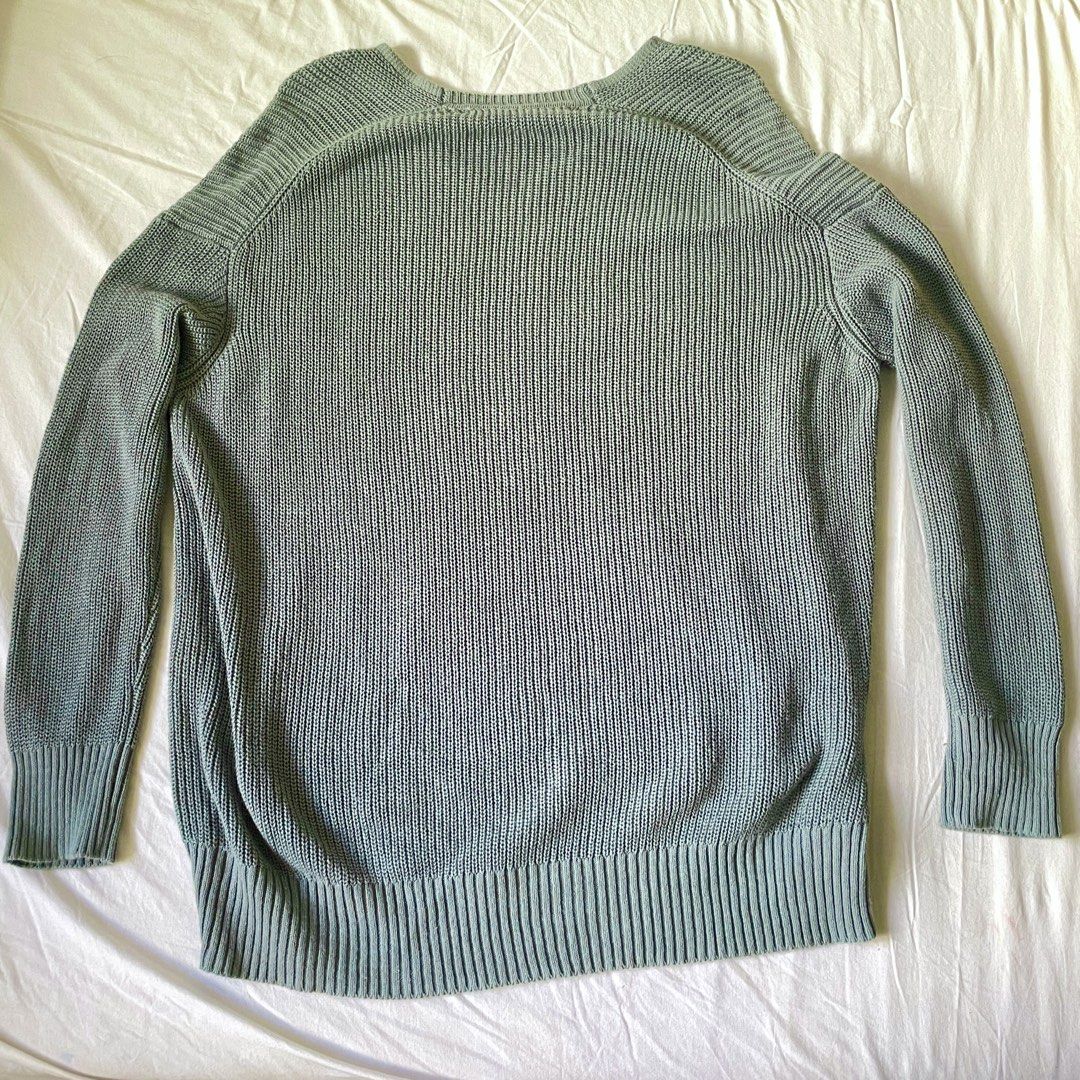 Sage green knitted longsleeves sweater (Category: Longsleeves) located in Quezon City. Submitted by endoffday (Listing ID 1447596614, Image 2). Description: Like new, oversized sweater RFS: extra clothes.