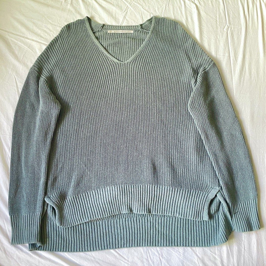 Sage green knitted longsleeves sweater (Category: Longsleeves) located in Quezon City. Submitted by endoffday (Listing ID 1447596614, Image 1). Description: Like new, oversized sweater RFS: extra clothes.