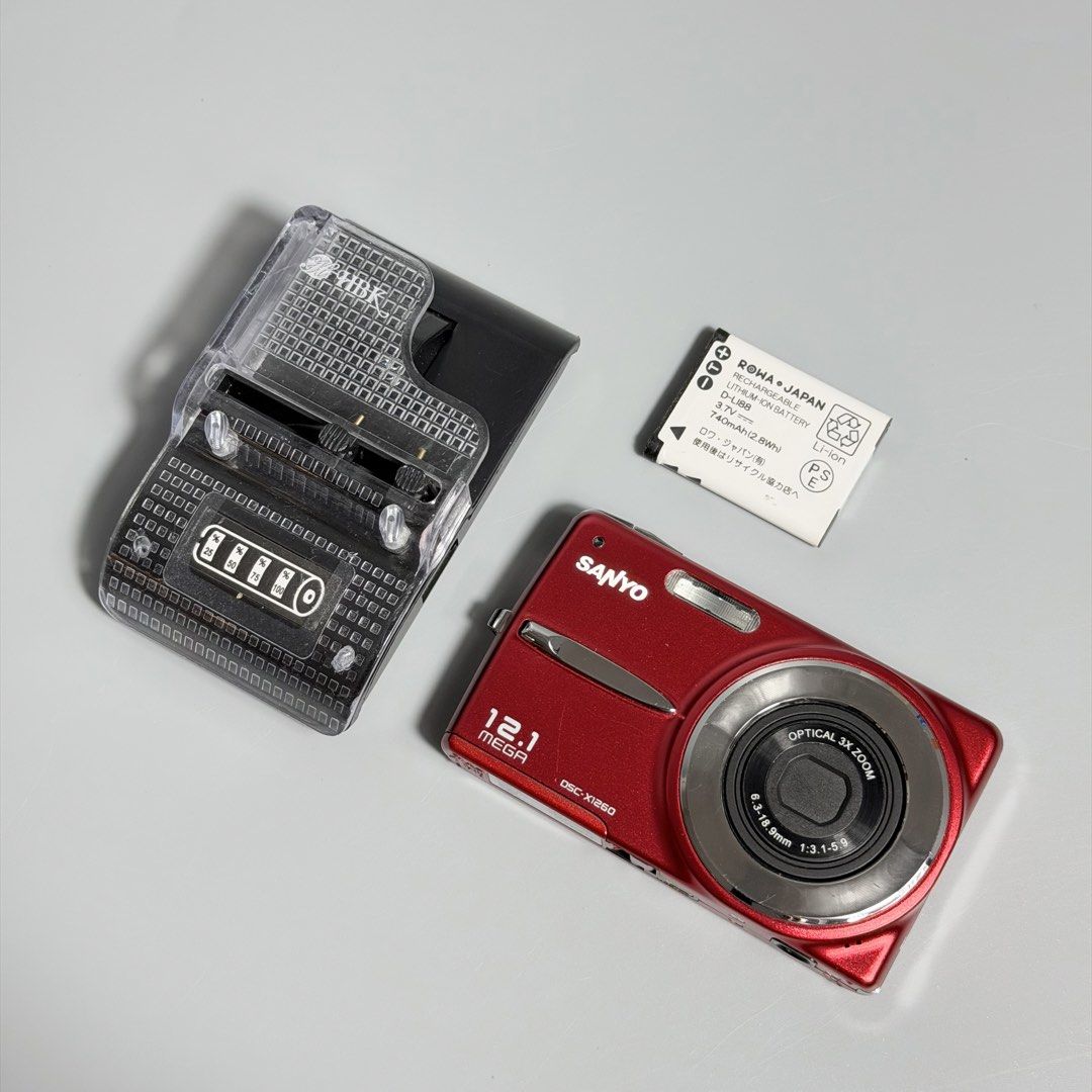 Sanyo X1260 Red - 12.1 Megapixel Digital Camera (Category: Cameras) located in Cavite. Submitted by datsoretro (Listing ID 1447659961, Image 2). Description: A fully functional unit with no problems with operation. Minimal scratches (see photos) & very vibrant color. An SD storage can be provided for free with listed price if ever you need one. ZOOM: OK FLASH: OK PLAYBACK: OK SD CARD SAVING: OK Drop by or pickup if you want to test the item (poss