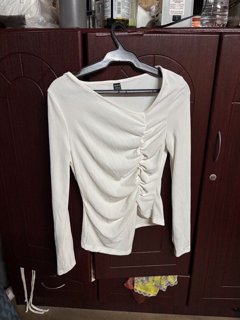 SHEIN Ruched Asymmetrical Neck Long Sleeve Top (Category: Longsleeves) located in Makati City. Submitted by clutterfairie (Listing ID 1447588532, Image 3). Description: - Long sleeve top - Ruched detailing on the side - Asymmetrical neckline - Stretchy and comfortable material - Perfect for dressing up or down - Available colors: Grey, Black, White.