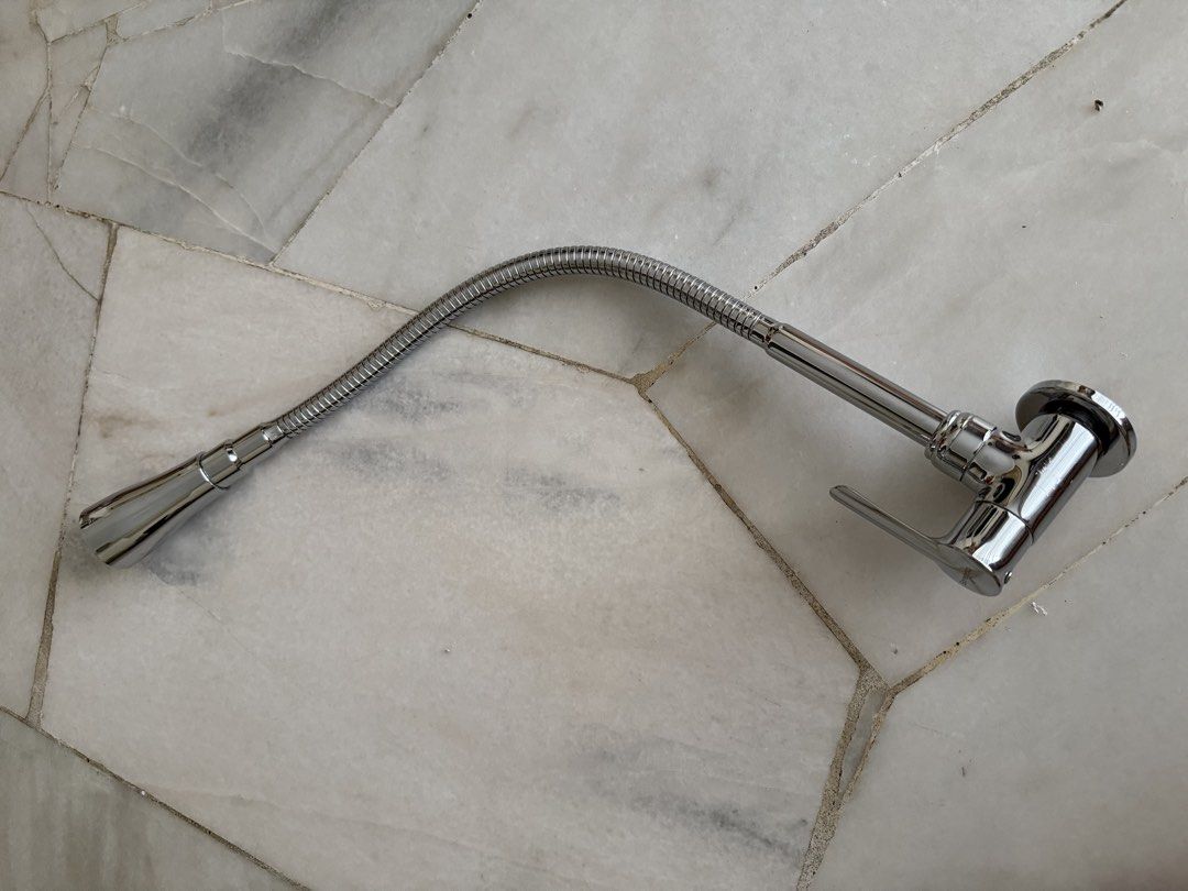 SORENTO SRTWT5826 Wall Mounted Kitchen Tap Brass Flexible Hose (Category: Bathroom & Kitchen Fixtures) located in Ampang. Submitted by kw______ (Listing ID 1447490257, Image 3). Description: - Wall-mounted kitchen tap - Model: SRTWT5826 - Material: Brass - Features: Flexible hose for easy reach - Height: 318mm - Ideal for kitchen use.