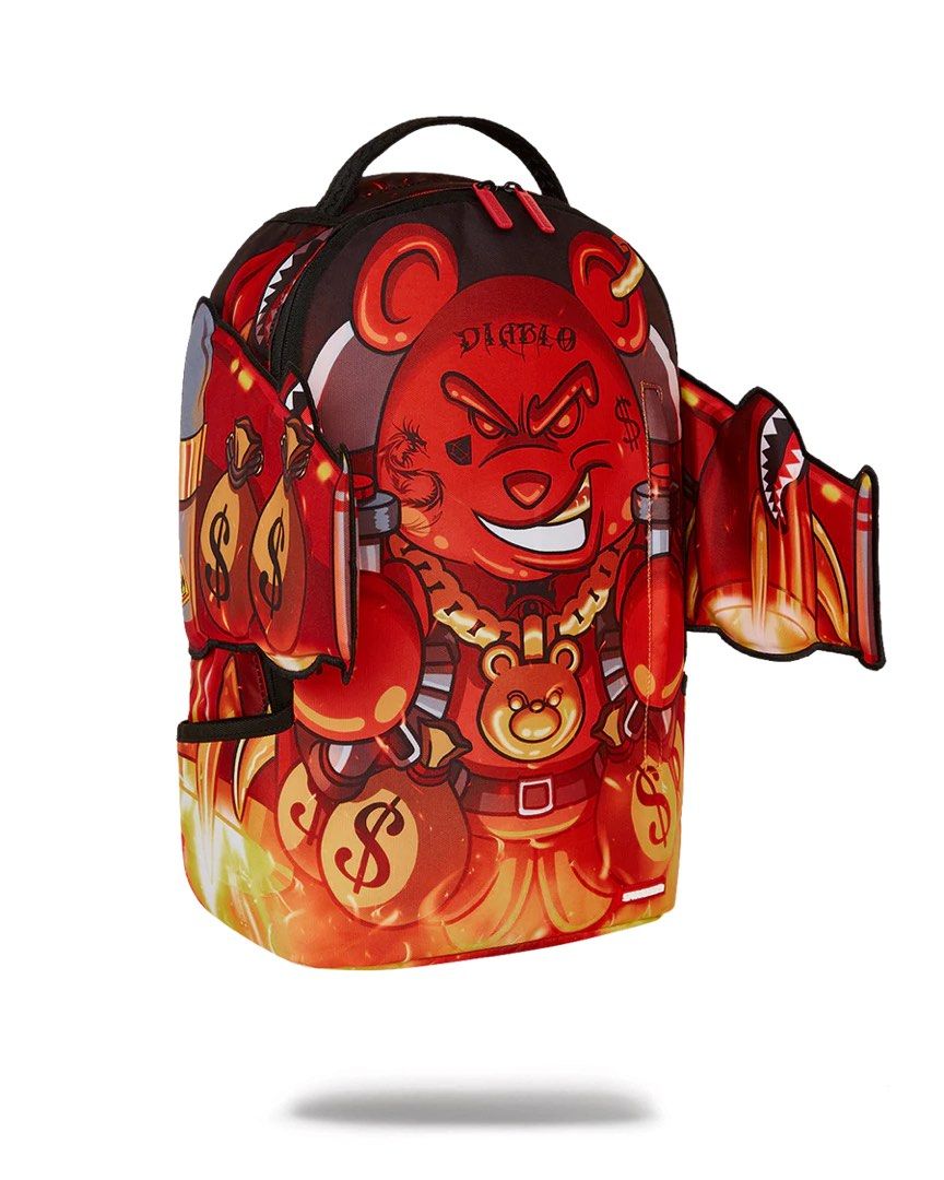 Sprayground Jetblast Diablo Wing Backpack (Category: Backpacks) located in Mandaluyong City. Submitted by knix01 (Listing ID 1447582856, Image 1). Description: •This is a Sprayground® Jetblast Diablo Wing backpack featuring a bold graphic of money bags and the brand’s iconic shark mouth design •Comes in its original packaging, from USA (listed as sold-out forever) .