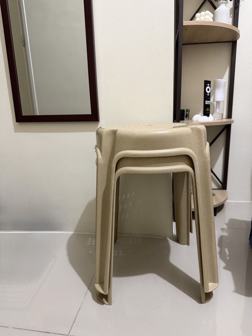 Stackable Beige Plastic Stools (Set of 2) (Category: Chairs) located in Manila. Submitted by eyngel9657 (Listing ID 1447506701, Image 1). Description: - Set of 2 beige plastic stools - Stackable design for convenient storage - Provides extra seating for guests - Sturdy and practical for everyday use - Ideal for kitchens, balconies, and small spaces.