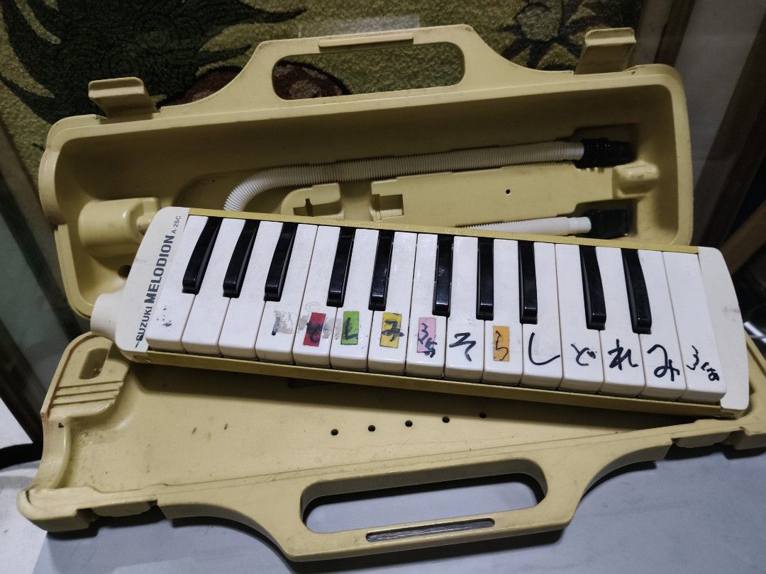 Suzuki Melodion Melodion Melodica with Case (Category: Musical Instruments) located in Manila. Submitted by reascheyss51406 (Listing ID 1447592505, Image 3). Description: - Suzuki Melodion - Comes with hard case and mouthpiece - Features some Japanese writing on the keys - Ideal for music learners - Pre-loved and ready for a new owner.