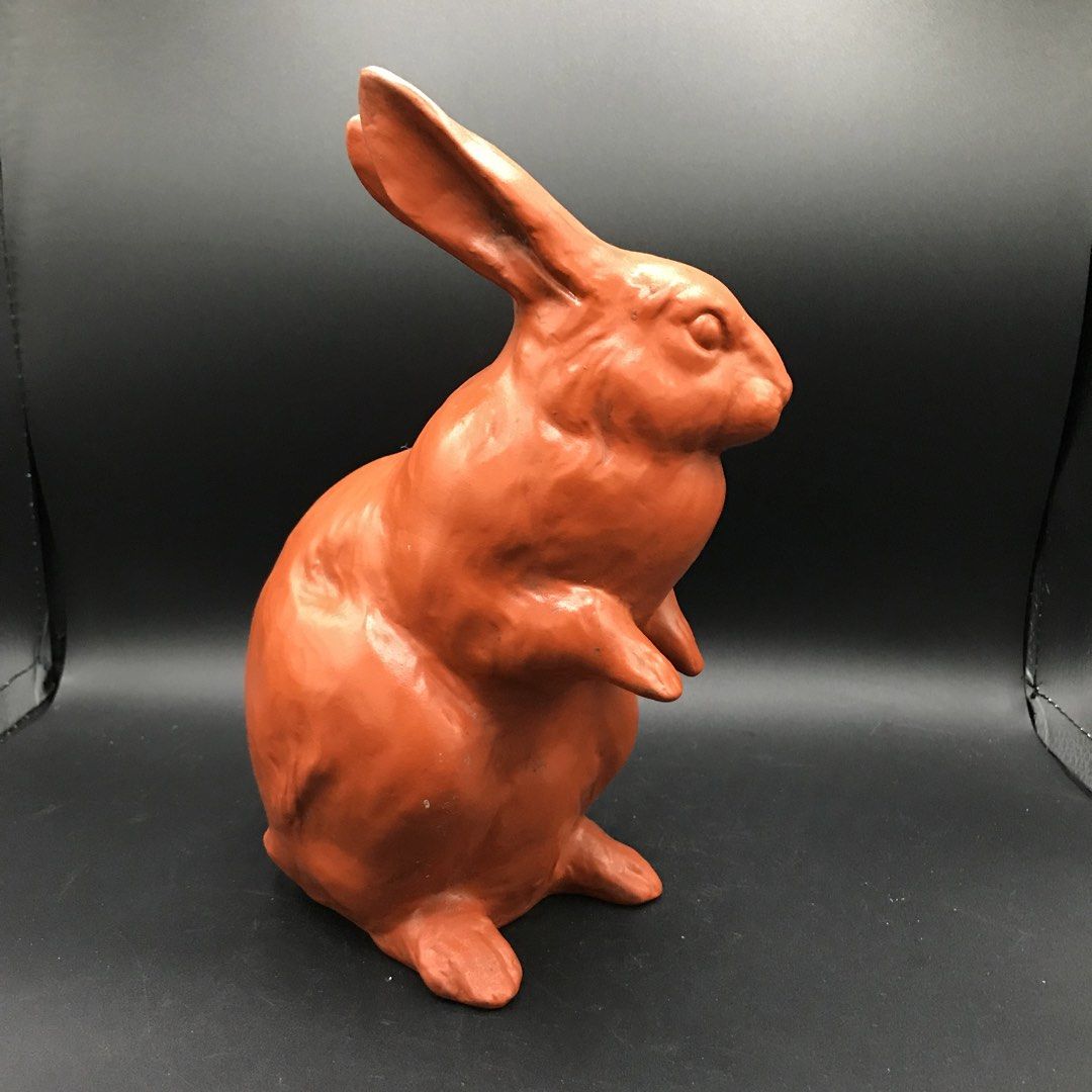 Terracotta Rabbit Figurine - Cute Home Decor (Category: Other Home Decor) located in Baao. Submitted by all.things.japan (Listing ID 1447638419, Image 3). Description: Height: 9.0 inches - Charming terracotta rabbit figurine - Rustic, earthy orange-brown color - Stands upright with paws forward - Features a small opening at the bottom - Adds character to shelves and tables.