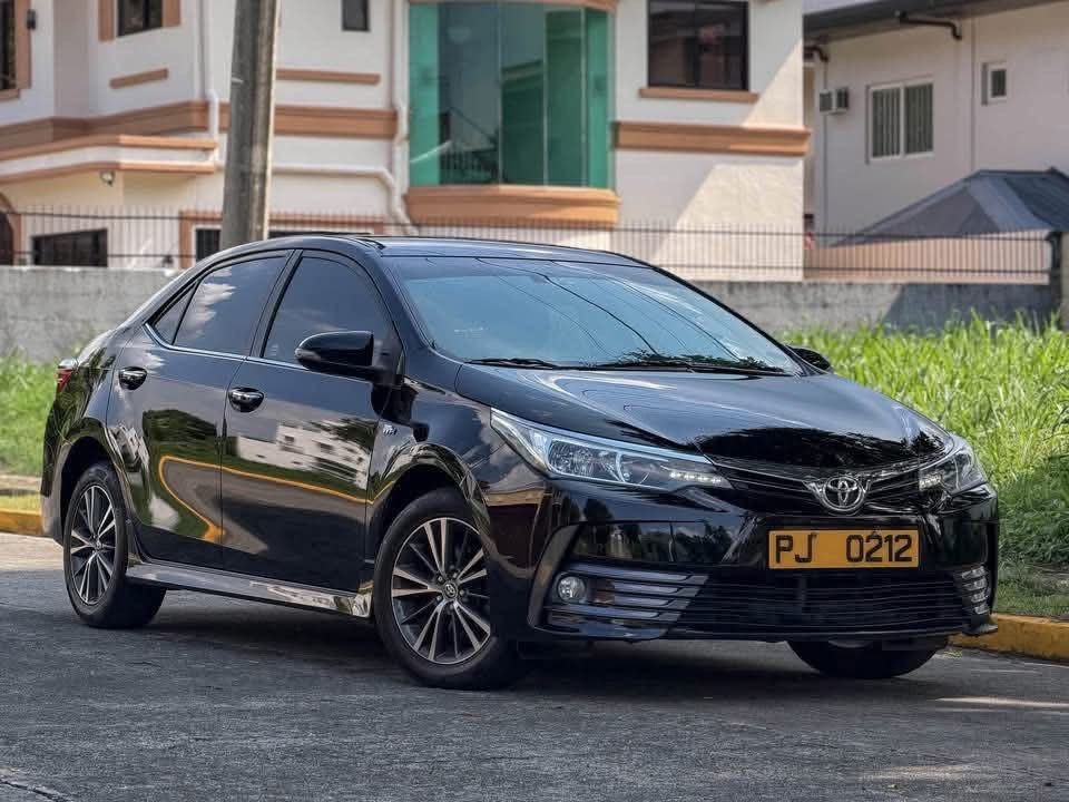 Toyota Corolla Altis 1.6V Auto (Category: Used Cars) located in Manila. Submitted by quality_cars (Listing ID 1447629949, Image 2). Description: COMPLETE CASA RECORDS SINCE DAY 1 💯 TOYOTA COROLLA ALTIS 1.6V FOR SALE / SWAP / FINANCING 👍🏼 OWNER SELLER 📲Patrick Jaro Year Model: 2018 Color: Attitude Black Engine: 1.6-liter Dual VVTi Transmission: 7-Speed CVT Mileage: 100,000 (Untampered) Plate Ending: 3 ✅Well Maintained ✅All Working ✅Registered 