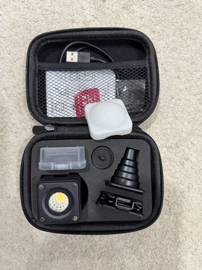 Ulanzi Portable LED Light Kit with Accessories (Category: Cameras) located in Muntinlupa City. Submitted by remixprod101 (Listing ID 1447492367, Image 1). Description: - Ulanzi Portable LED Light Kit - Includes LED light, charging cable, and various diffusers/modifiers - Comes with a Ulanzi carrying case for easy transport - Ideal for on-the-go lighting needs - Compact and highly portable Good as brandnew. No issues Pickup only Ayala Alabang.