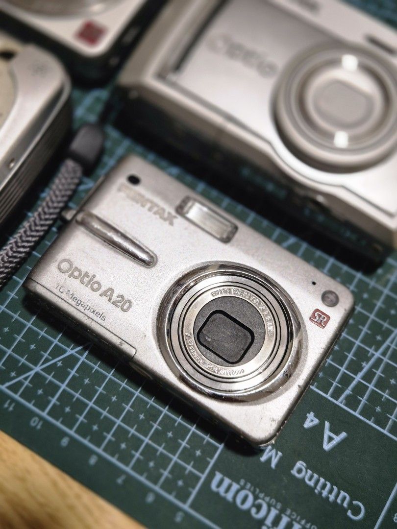 Untested Digicams (Category: Cameras) located in Iloilo. Submitted by heyjay10 (Listing ID 1447497724, Image 3). Description: Bundle of 4 digital cameras For parts/display buy at your own risk Includes: Pentax Optio, Pentax Optio A20, Fujifilm, and Olympus Camedia C-40 Zoom Loc: Iloilo city shipping available .
